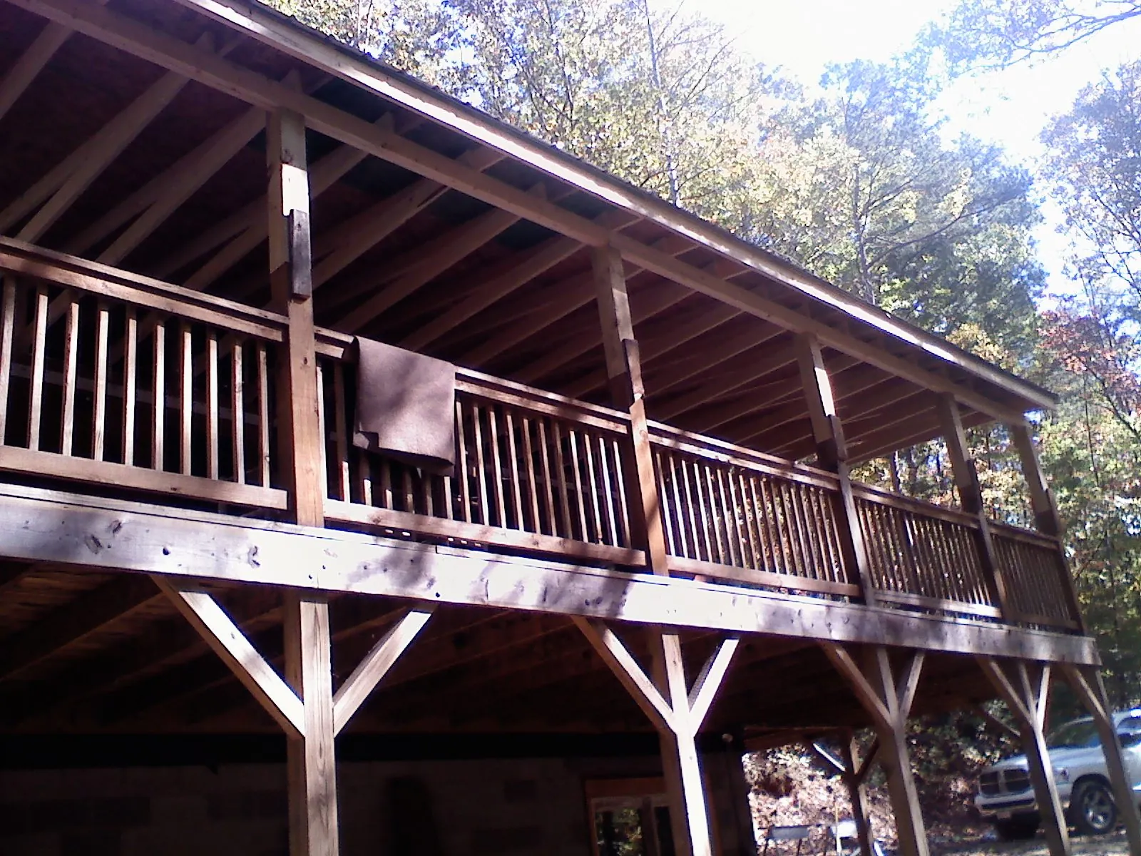 Timber framing under a new elevated porch and deck — Roof Leak Repair in East Millsboro by Roofing Brothers